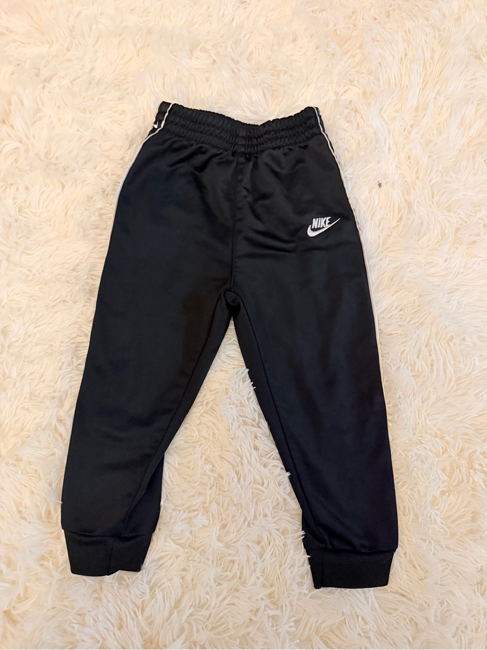 Nike Kids Black Jogger Sweatpants with White Swoosh